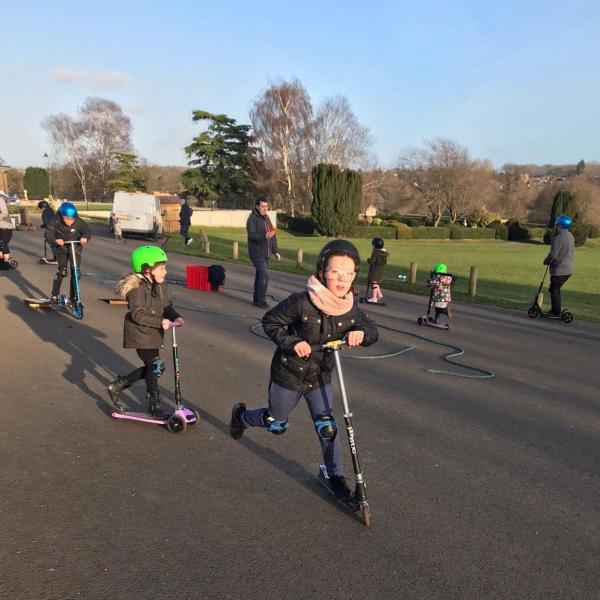 Kids scooting at Wicksteed.