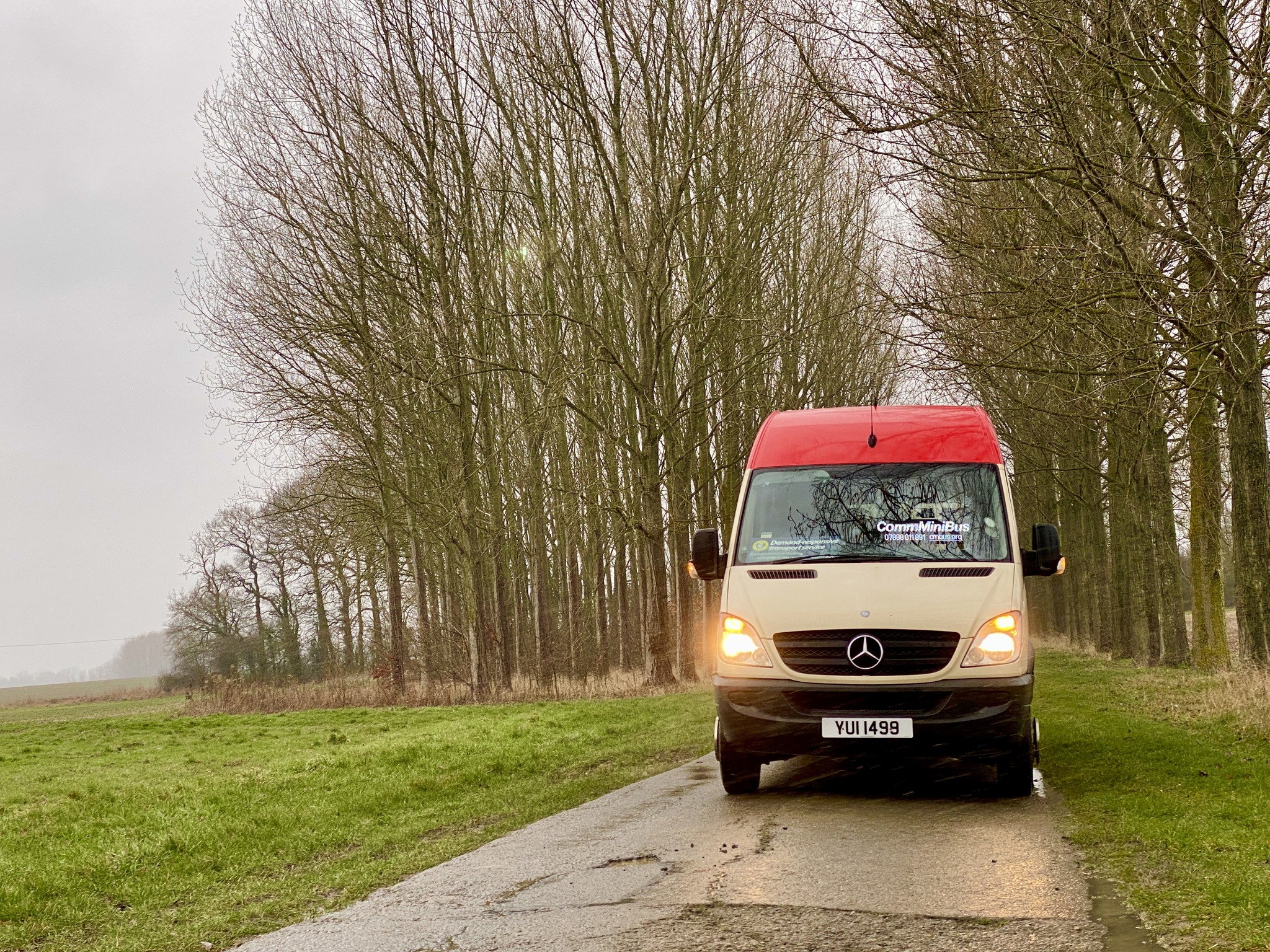 Comms Minibus on a country road