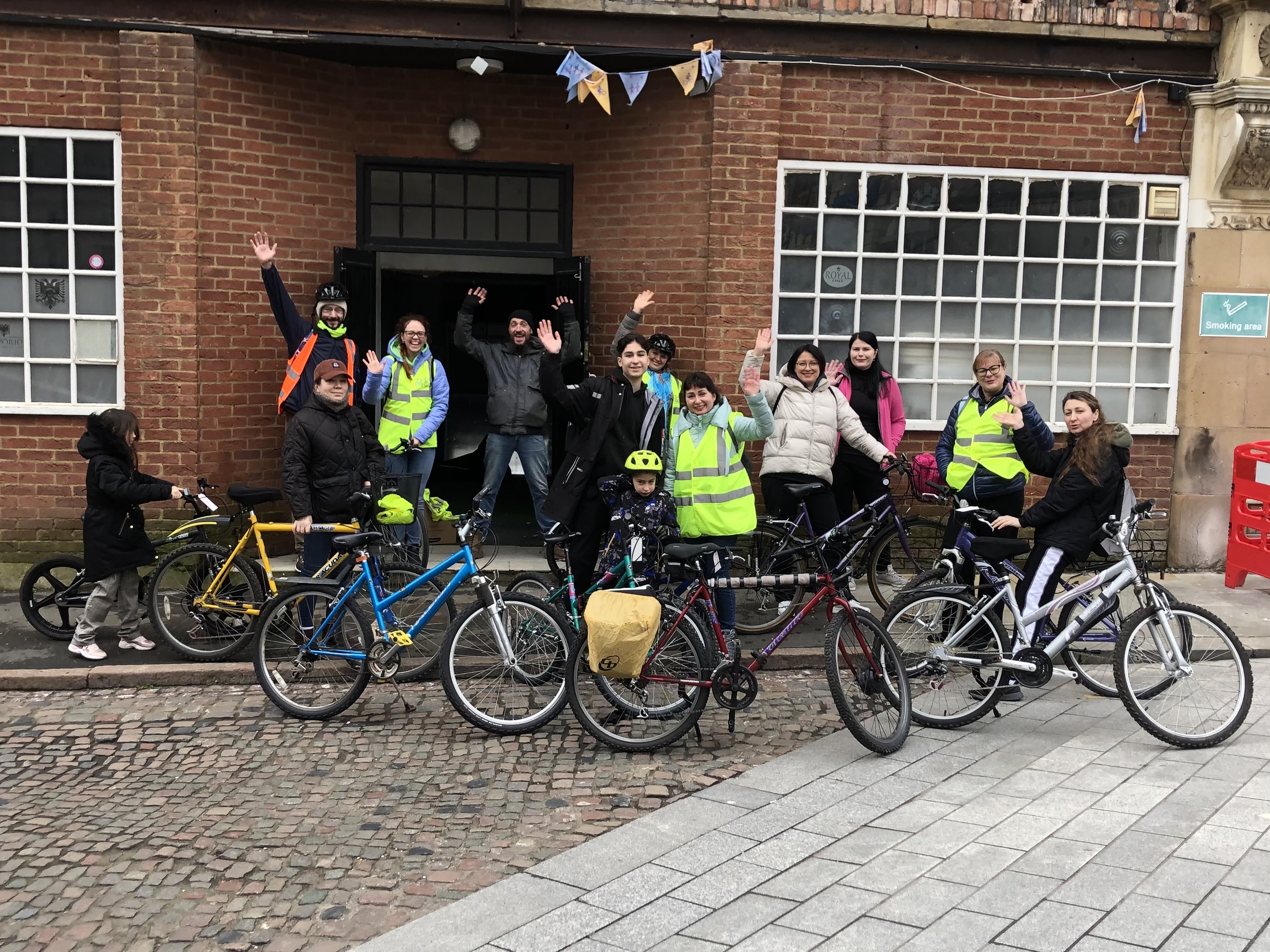 Cycle lingo team at the hub waving.