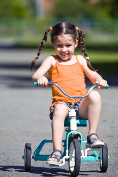 Girl on a trike.