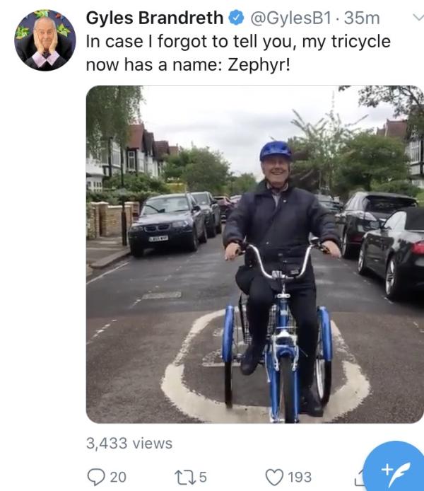 Gyles Brandreth on a trike.