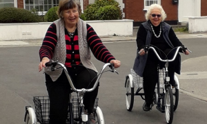 Ladies on trikes.