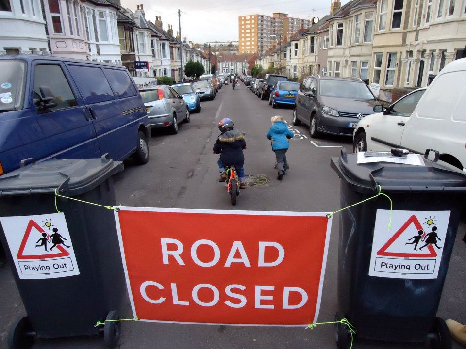 Kids cycling on the road.