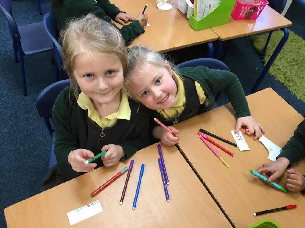 School Children with pencil and pens on the desk.