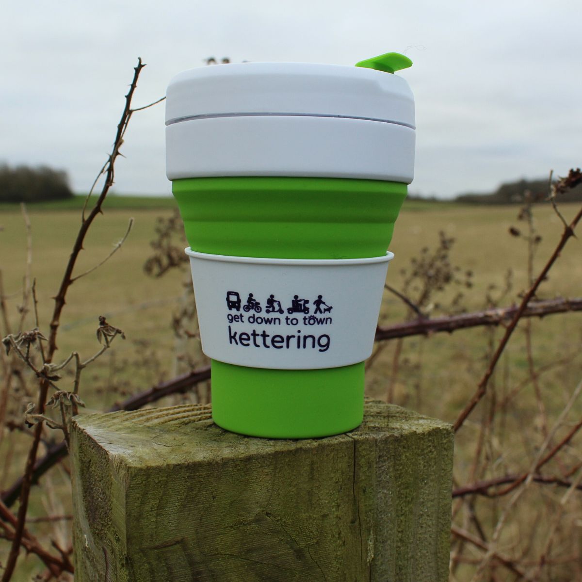Collapsible Cup, with a field background view