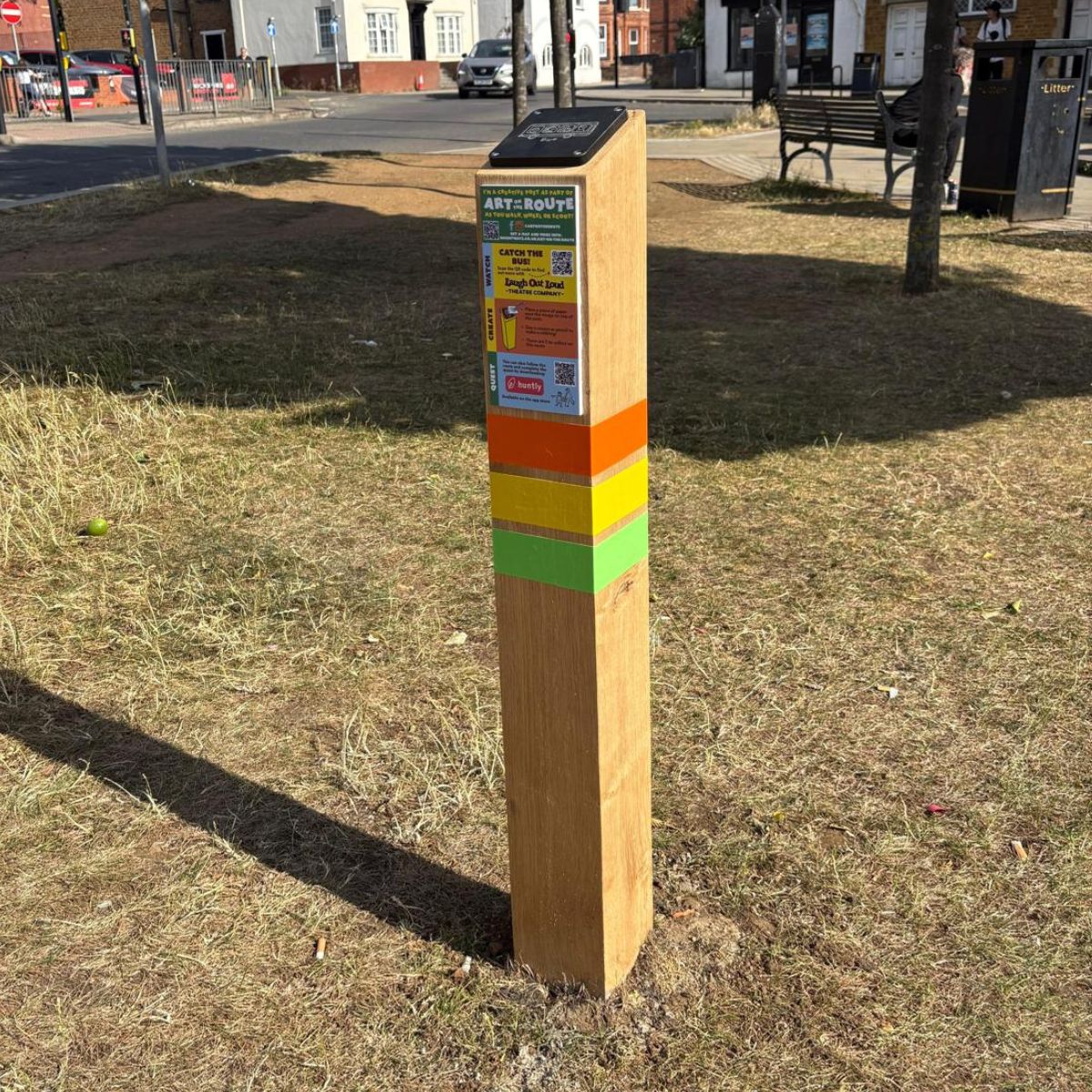 Horesemarket bus rubbing post with QR code.